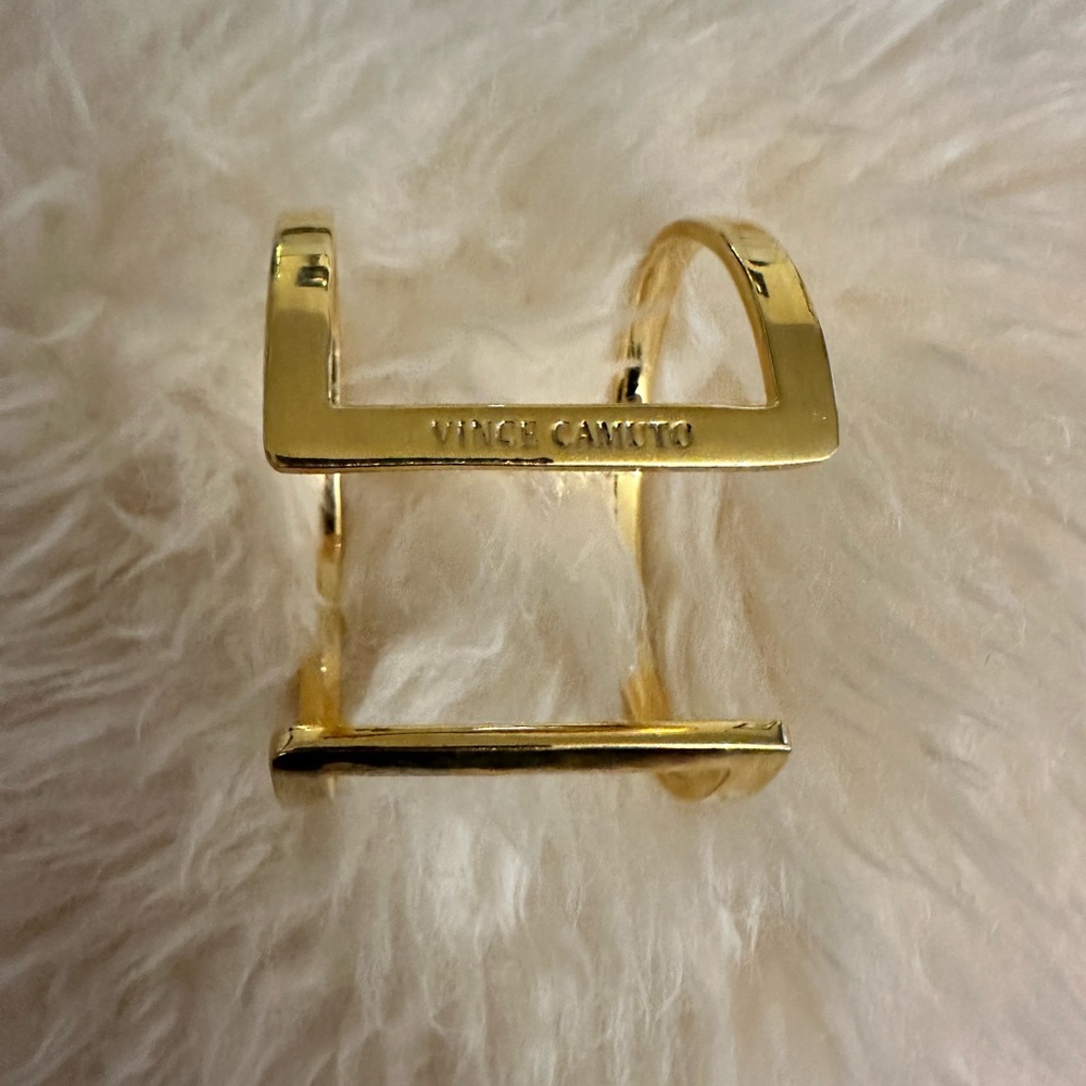 Good condition Vince Camuto Gold tone cuff. Worn once.